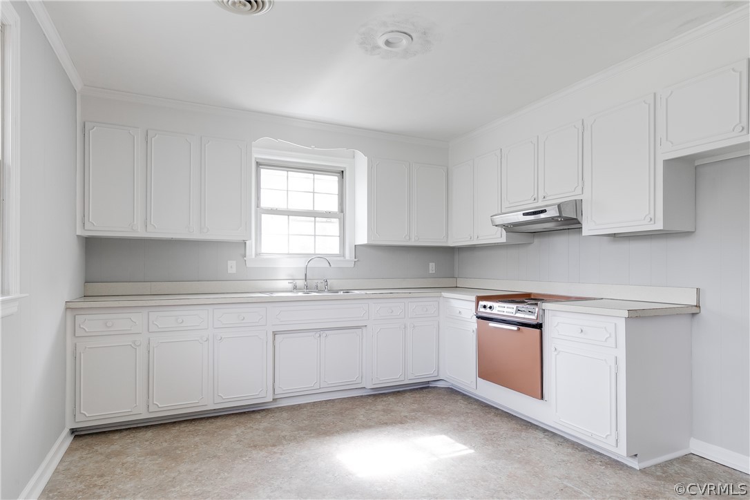 4440 Treely Road Chester, VA 23831 - Photo 17 of 39 a kitchen with stainless steel appliances granite countertop a sink and dishwasher a stove top oven with white cabinets