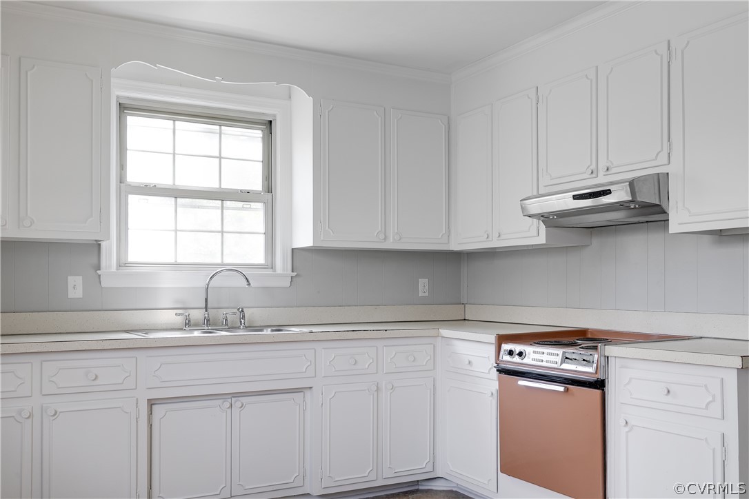 4440 Treely Road Chester, VA 23831 - Photo 18 of 39 a kitchen with appliances cabinets and a counter top space