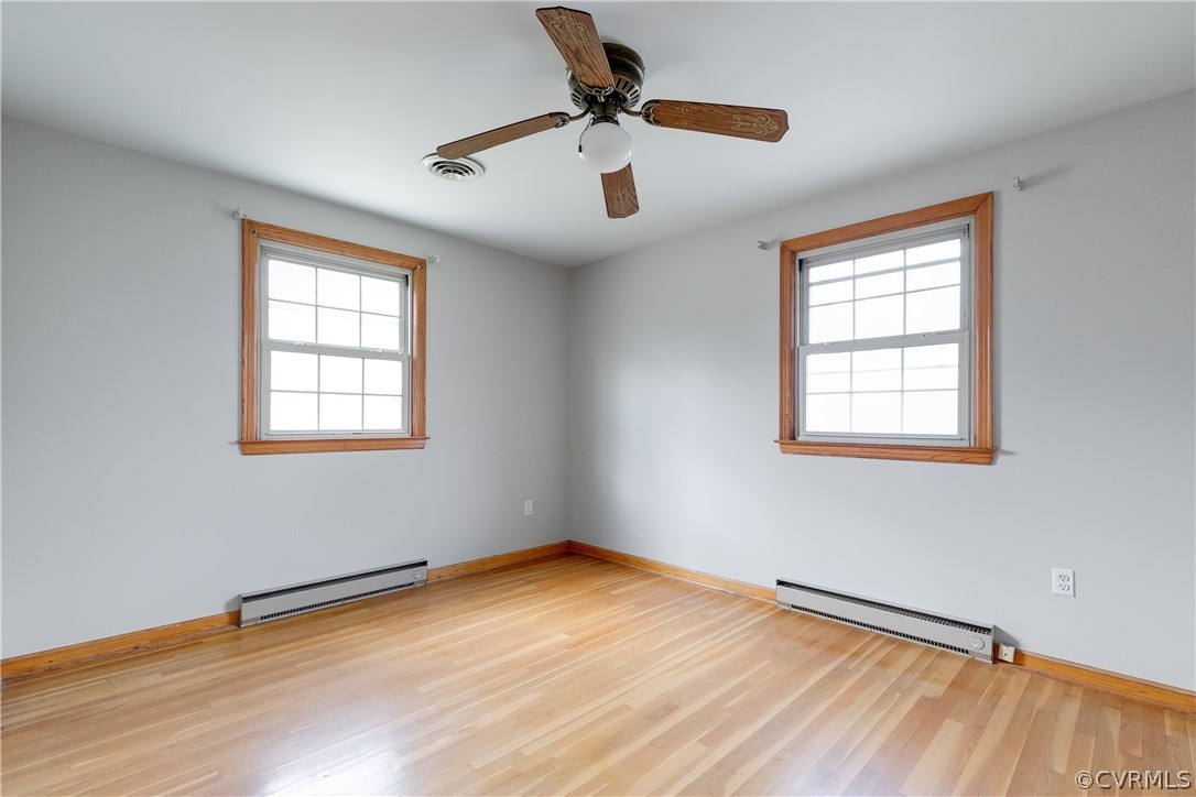 4440 Treely Road Chester, VA 23831 - Photo 23 of 39 a view of empty room with wooden floor and fan