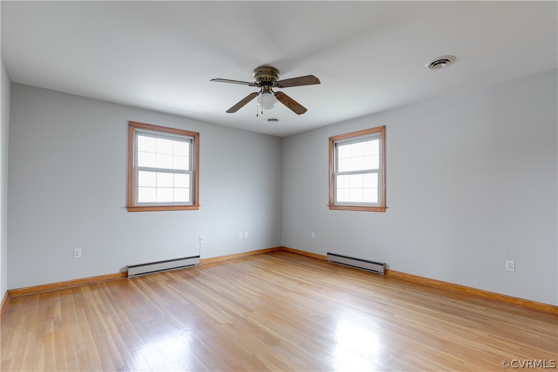 4440 Treely Road Chester, VA 23831 - Photo 25 of 39 a view of a room with wooden floor and ceiling fan