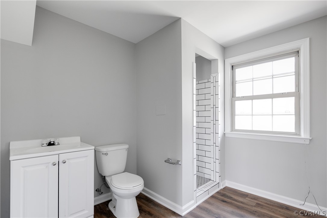 4440 Treely Road Chester, VA 23831 - Photo 35 of 39 a white toilet sitting next to a bathroom sink