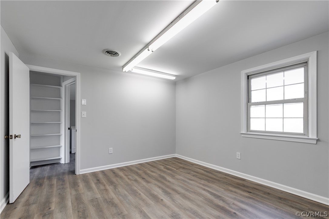 4440 Treely Road Chester, VA 23831 - Photo 39 of 39 an empty room with windows and closet