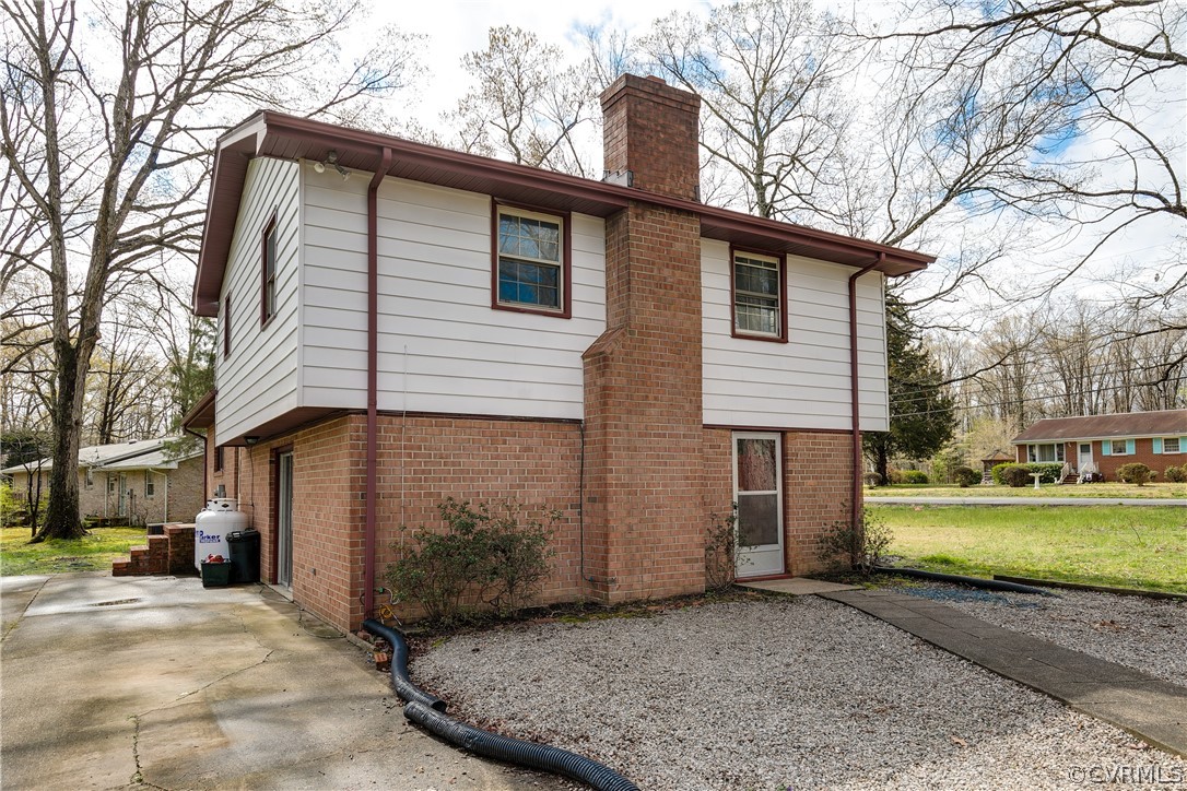 4440 Treely Road Chester, VA 23831 - Photo 6 of 39 a view of a house with a yard and large tree