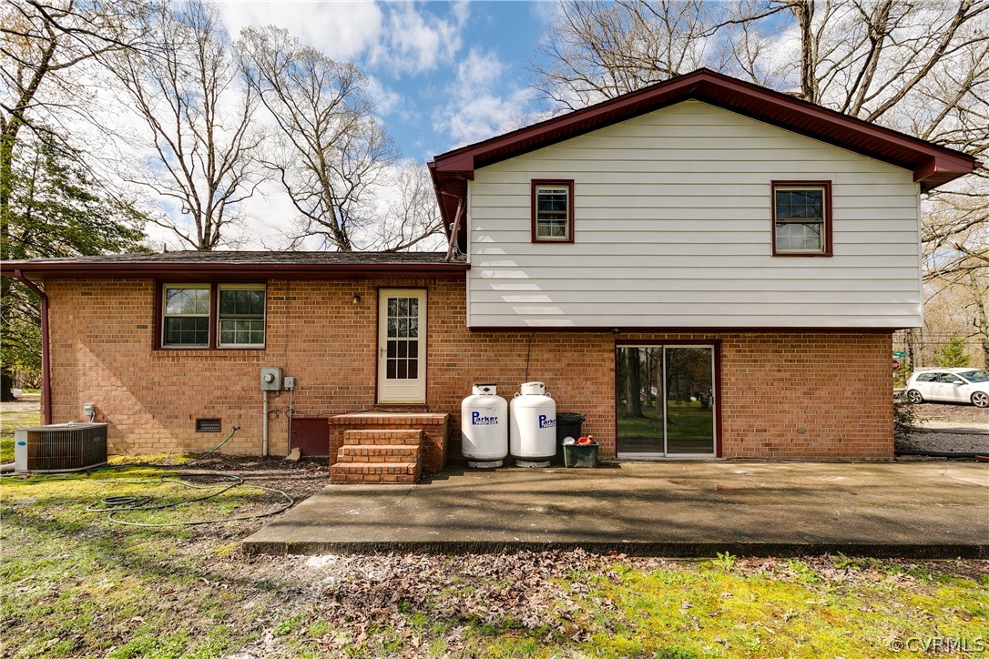 4440 Treely Road Chester, VA 23831 - Photo 7 of 39 a front view of a house with a yard