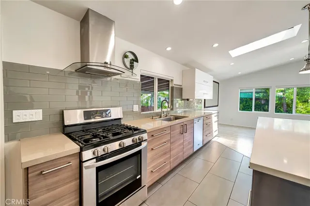 a view of a hallway with wooden floor and closet