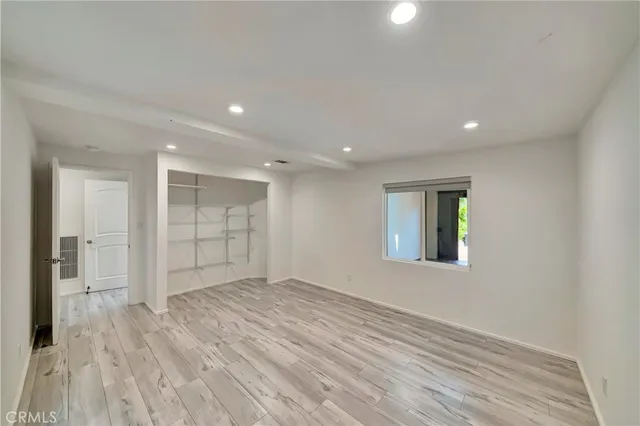 a en suite bathroom with a sink and a mirror
