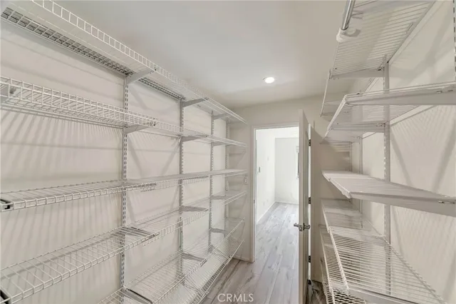 a view of a swimming pool with an outdoor seating