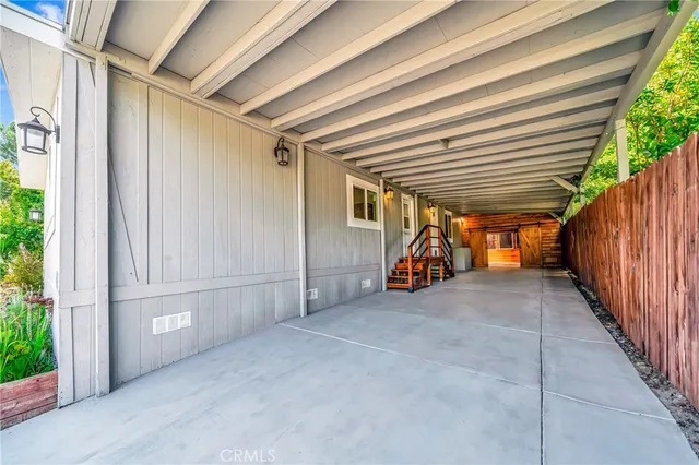 a view of residential houses with outdoor space