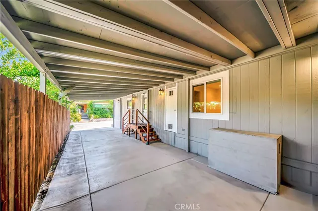 a view of a living room and a kitchen