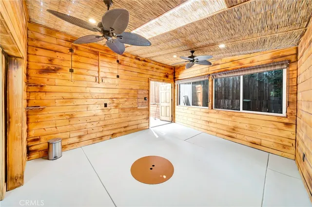 a view of a balcony with wooden floor