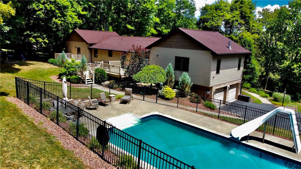 657 Fallecker Road Butler, PA 16002 - Photo 23 of 25 a aerial view of a house with swimming pool and porch