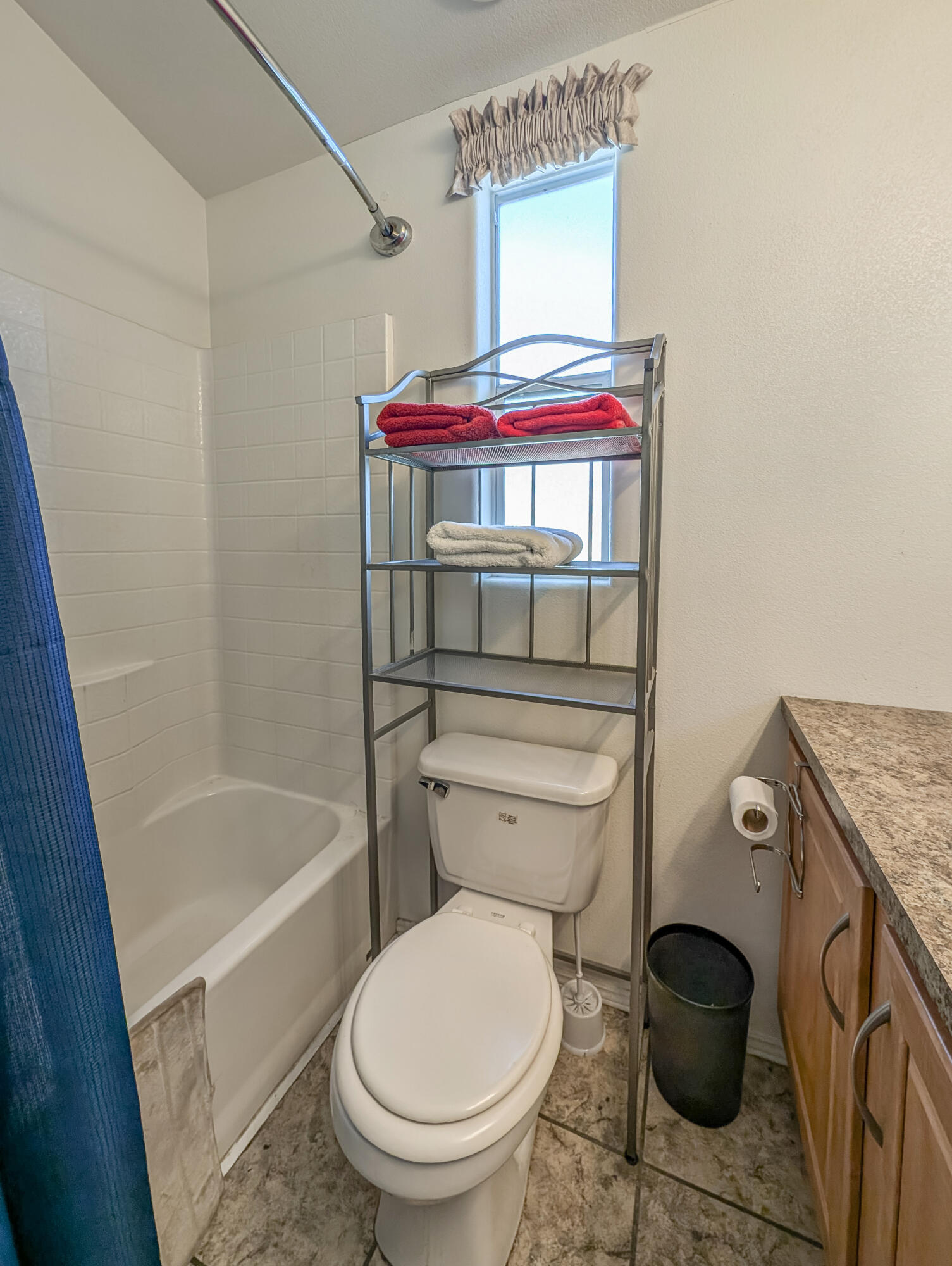 70200 Dillon Road, Unit 350 Desert Hot Springs, CA 92241 - Photo 13 of 22 a bathroom with a toilet and a shower