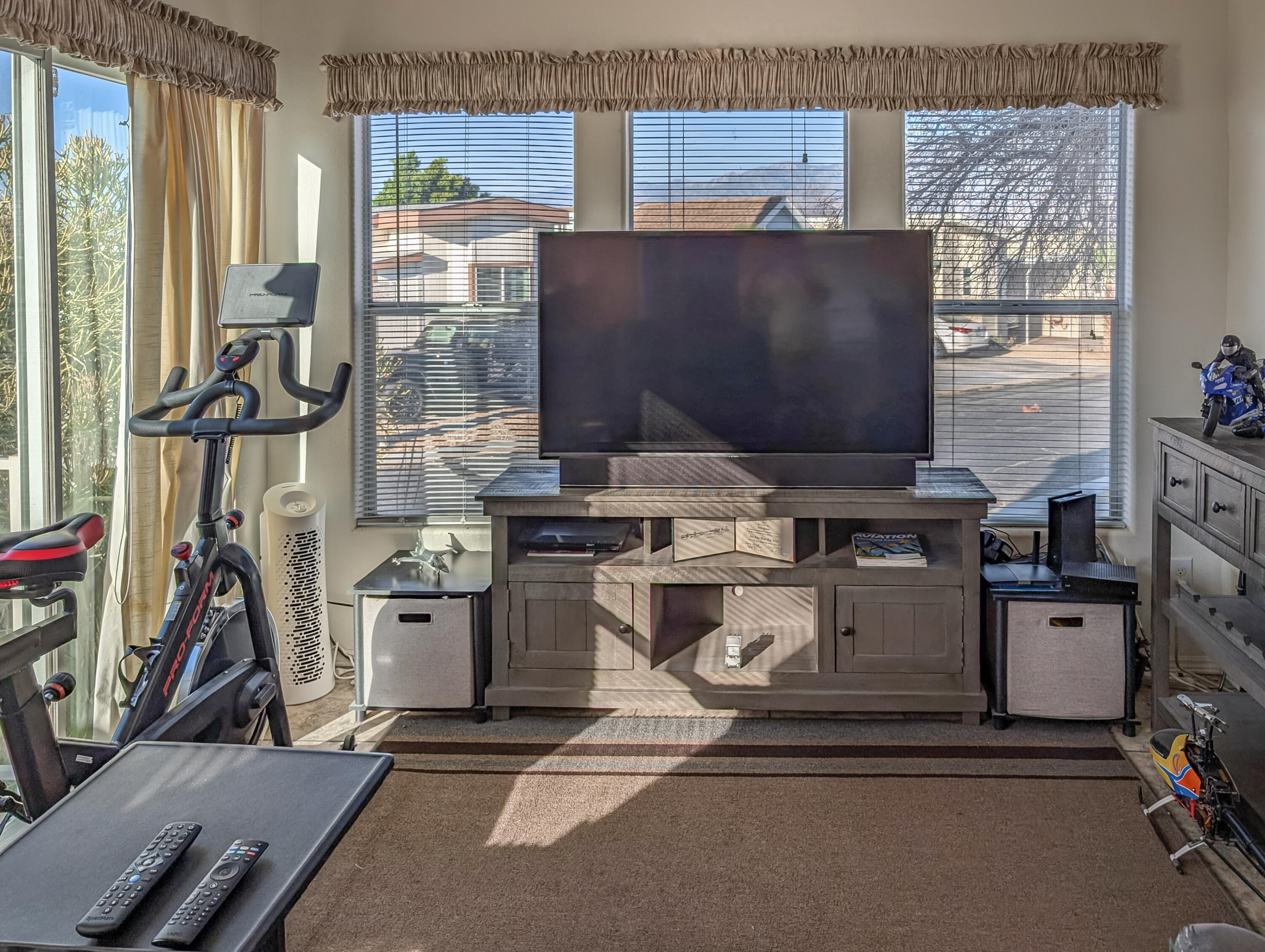 70200 Dillon Road, Unit 350 Desert Hot Springs, CA 92241 - Photo 5 of 22 a room with water heater and wooden cabinets