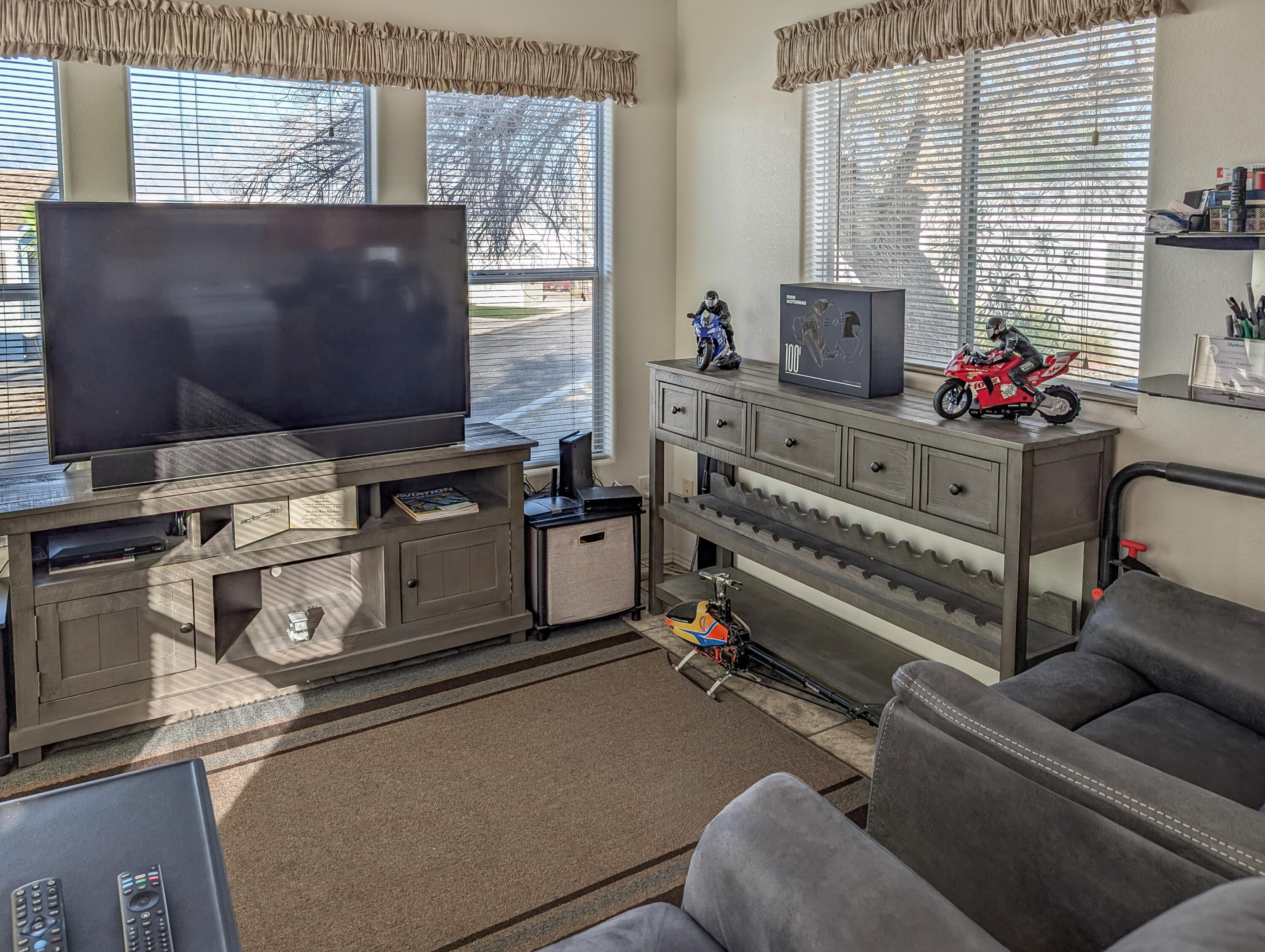 70200 Dillon Road, Unit 350 Desert Hot Springs, CA 92241 - Photo 6 of 22 a room with furniture and flat screen tv