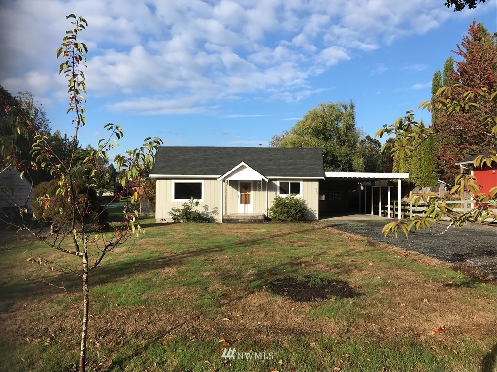 605 Southwest 19th Street Chehalis, WA 98532 - Photo 1 of 1 a front view of a house with garden