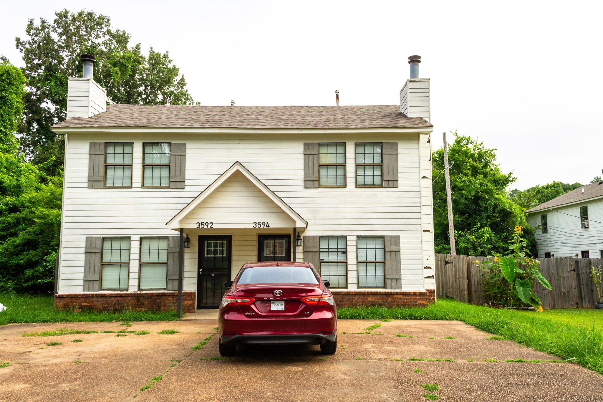 3592 Christine Road Memphis, TN 38118 - Photo 1 of 13 Two-story duplex featuring white siding and coordinating dark shutters