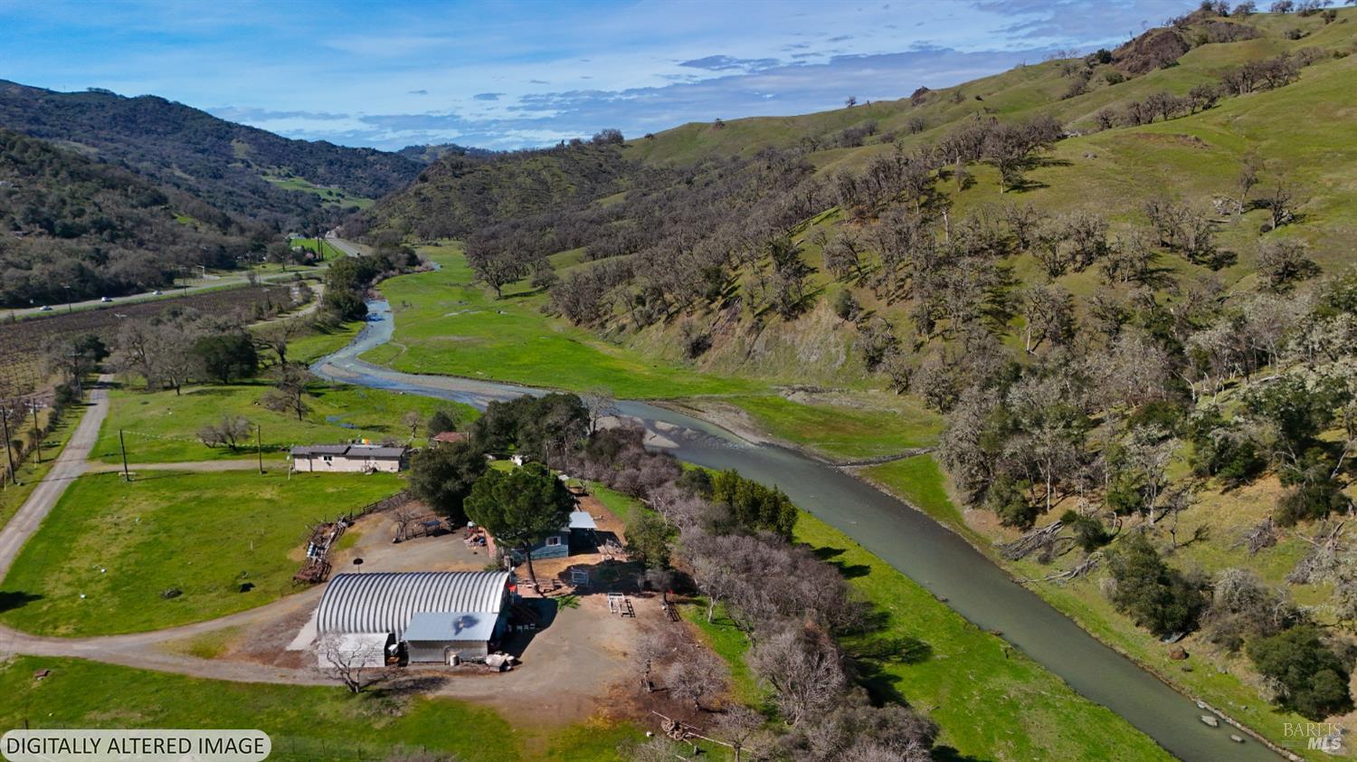 6750 State Highway 20 Ukiah, CA 95482 - Photo 13 of 37 an aerial view of a house with a garden