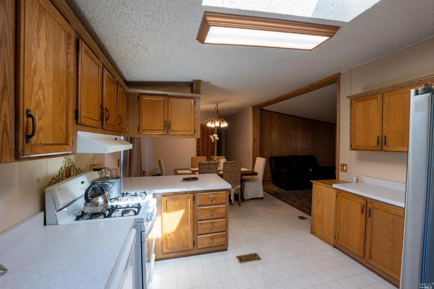 6750 State Highway 20 Ukiah, CA 95482 - Photo 20 of 37 a kitchen that has a sink and a stove in it