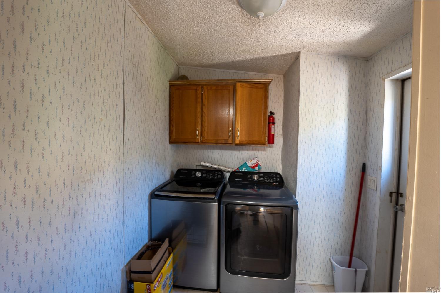 6750 State Highway 20 Ukiah, CA 95482 - Photo 21 of 37 a kitchen with a stove and a refrigerator