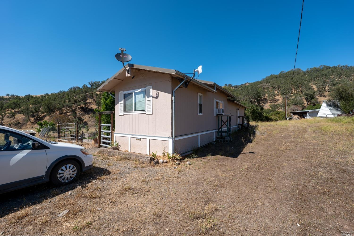 6750 State Highway 20 Ukiah, CA 95482 - Photo 31 of 37 a view of a car in front of a house