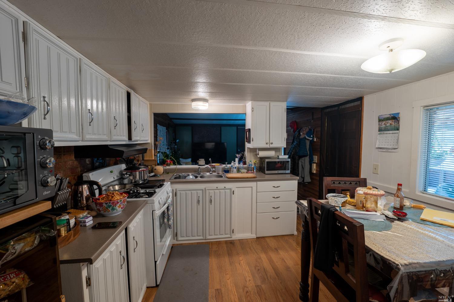 6750 State Highway 20 Ukiah, CA 95482 - Photo 36 of 37 a kitchen with lots of counter top space and appliances