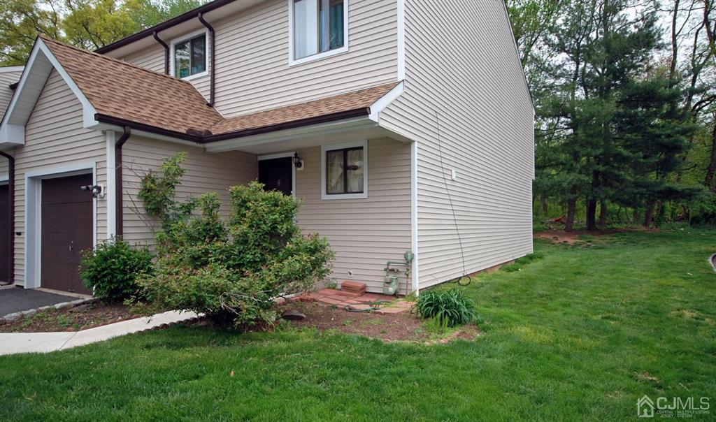 2 Tulip Court Edison, NJ 08820 - Photo 3 of 34 a view of a house with a yard and plants