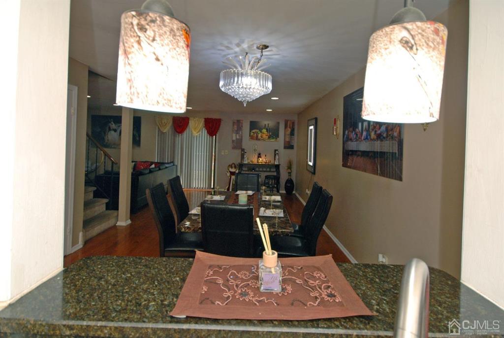 2 Tulip Court Edison, NJ 08820 - Photo 10 of 34 a view of a dining room with furniture