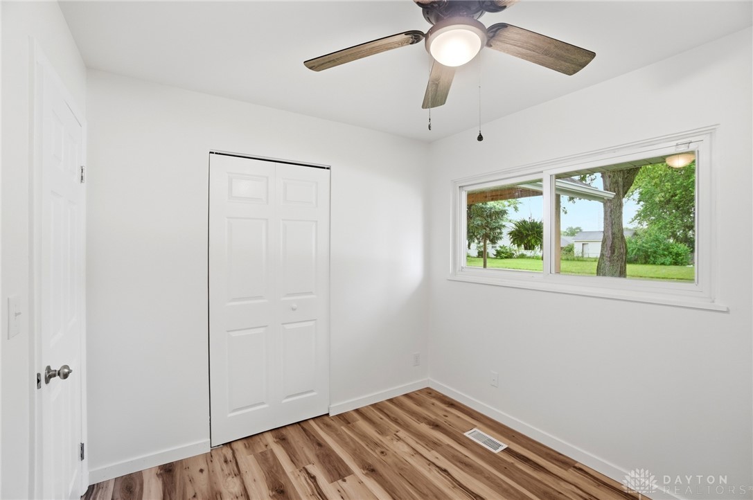 1923 Portage Path Springfield, OH 45506 - Photo 30 of 40 A quiet retreat with durable flooring and verdant outdoor views through a wide window.