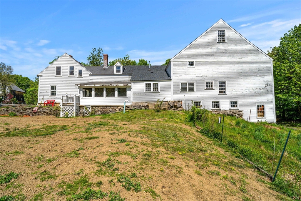 600 Main Street Ashby, MA 01431 - Photo 38 of 40 a front view of a house with a yard