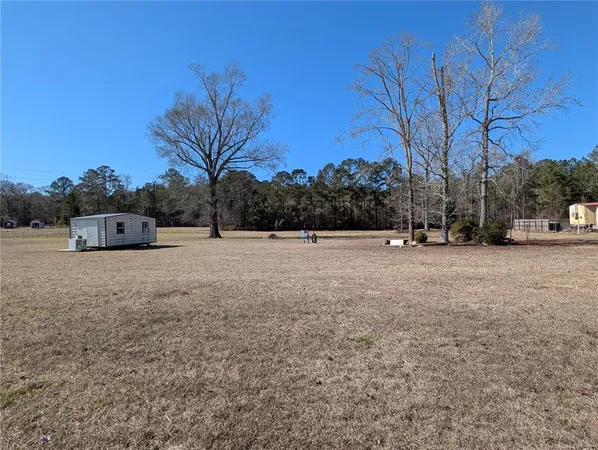 a view of open space with trees