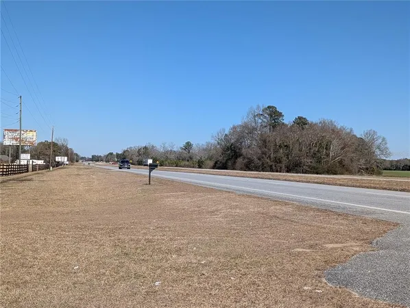 a fire hydrant in the middle of a field
