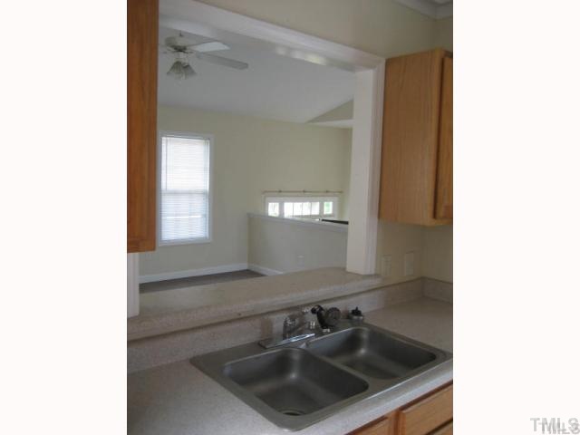 3201 Stedman Drive Raleigh, NC 27607 - Photo 4 of 7 a bathroom with a sink and a mirror