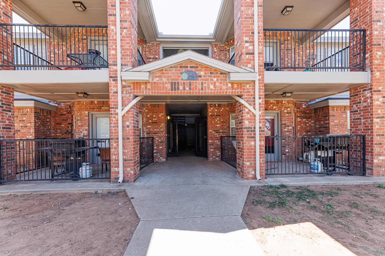 5845 7th Street Lubbock, TX 79416 - Photo 3 of 8 a view of a building with sitting area
