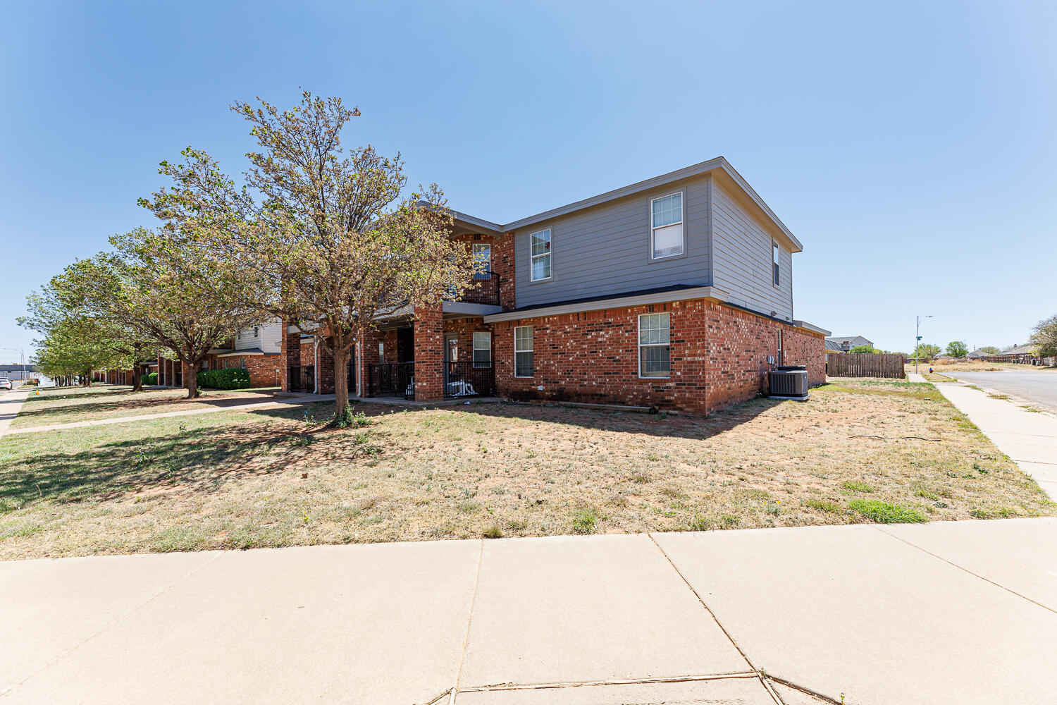 5845 7th Street Lubbock, TX 79416 - Photo 5 of 8 a house view with a outdoor space