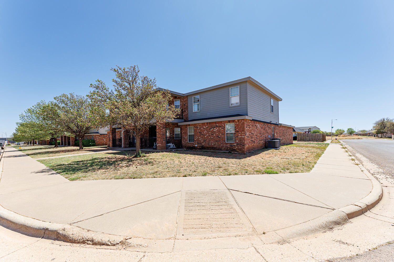 5845 7th Street Lubbock, TX 79416 - Photo 6 of 8 a view of a house with a snow