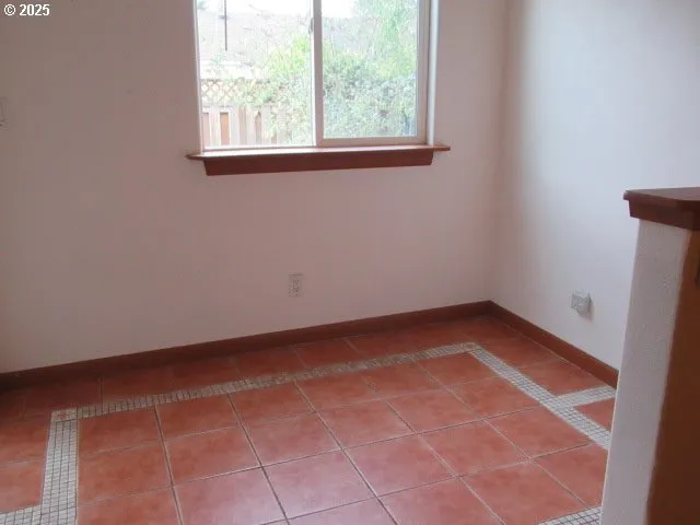 a view of a room with a window