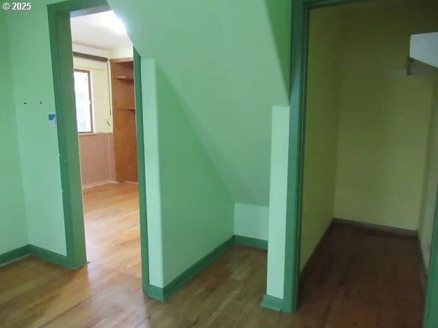 a view of a bathroom from a hallway