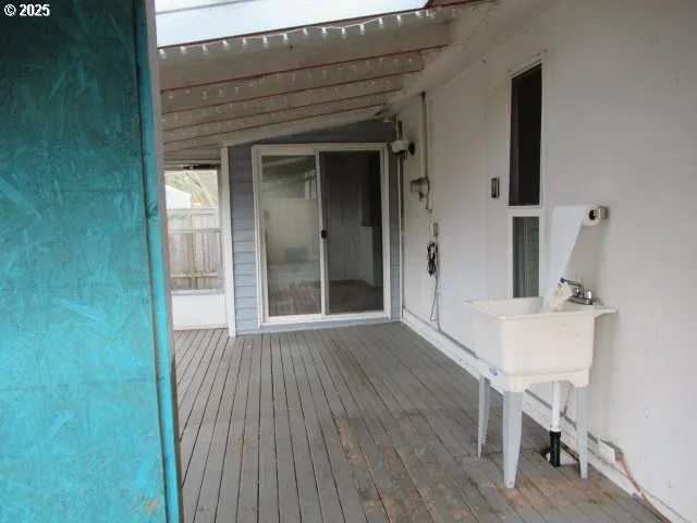 a view of a house with wooden floor and chair