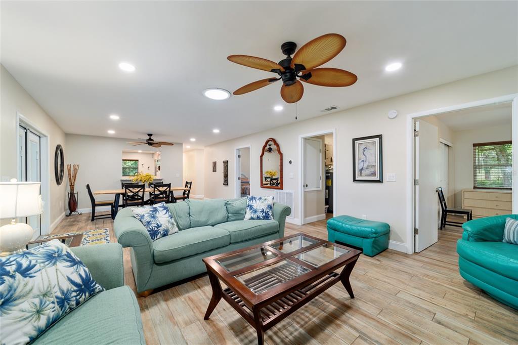 16520 Northwest 170th Street Williston, FL 32696 - Photo 20 of 98 a living room with furniture and a wooden floor