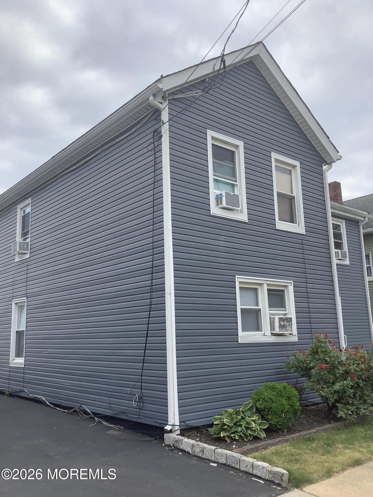 242 1st Street Keyport, NJ 07735 - Photo 3 of 23 a view of a house with a garage