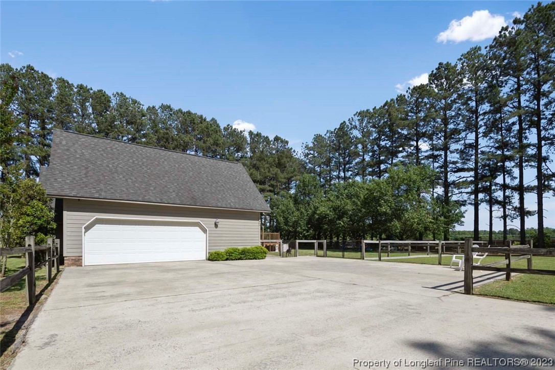 2451 Turnpike Road Raeford, NC 28376 - Photo 4 of 32 a house view with a outdoor space