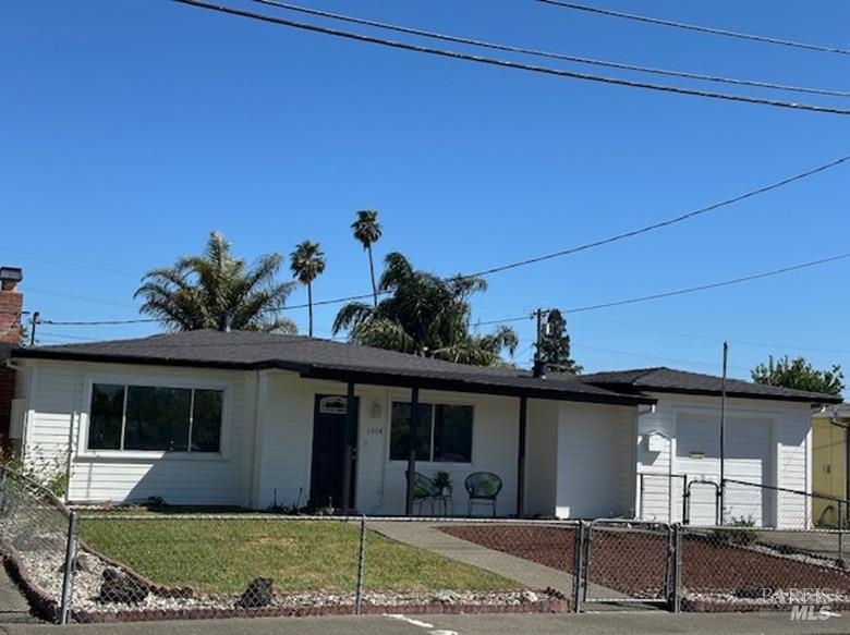 1304 McGregor Avenue Petaluma, CA 94954 - Photo 1 of 1 a view of a house with a yard