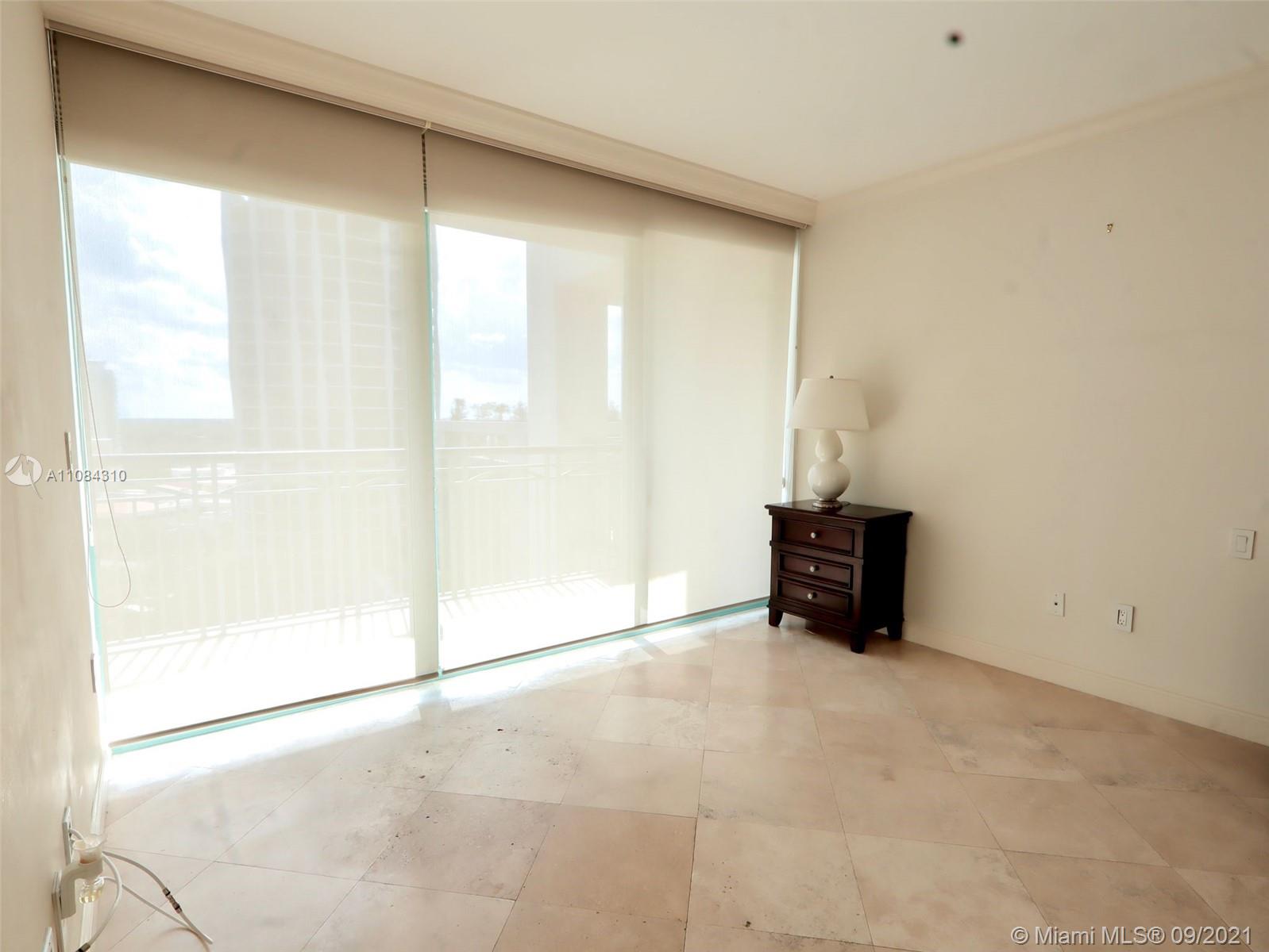 The Grove Coconut Grove, FL 33133 - Photo 16 of 31 a room with a bed and a window