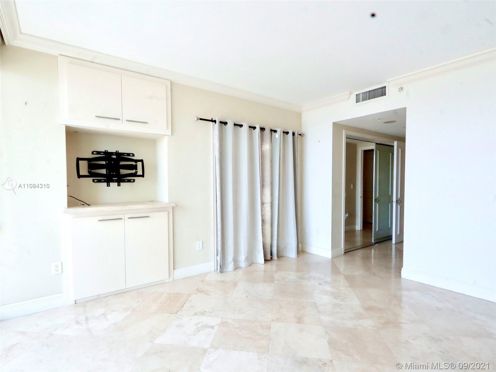 The Grove Coconut Grove, FL 33133 - Photo 26 of 31 a view of a livingroom with a kitchen
