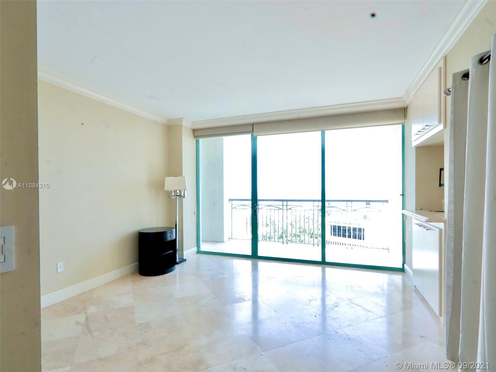 The Grove Coconut Grove, FL 33133 - Photo 27 of 31 a view of an empty room with a window