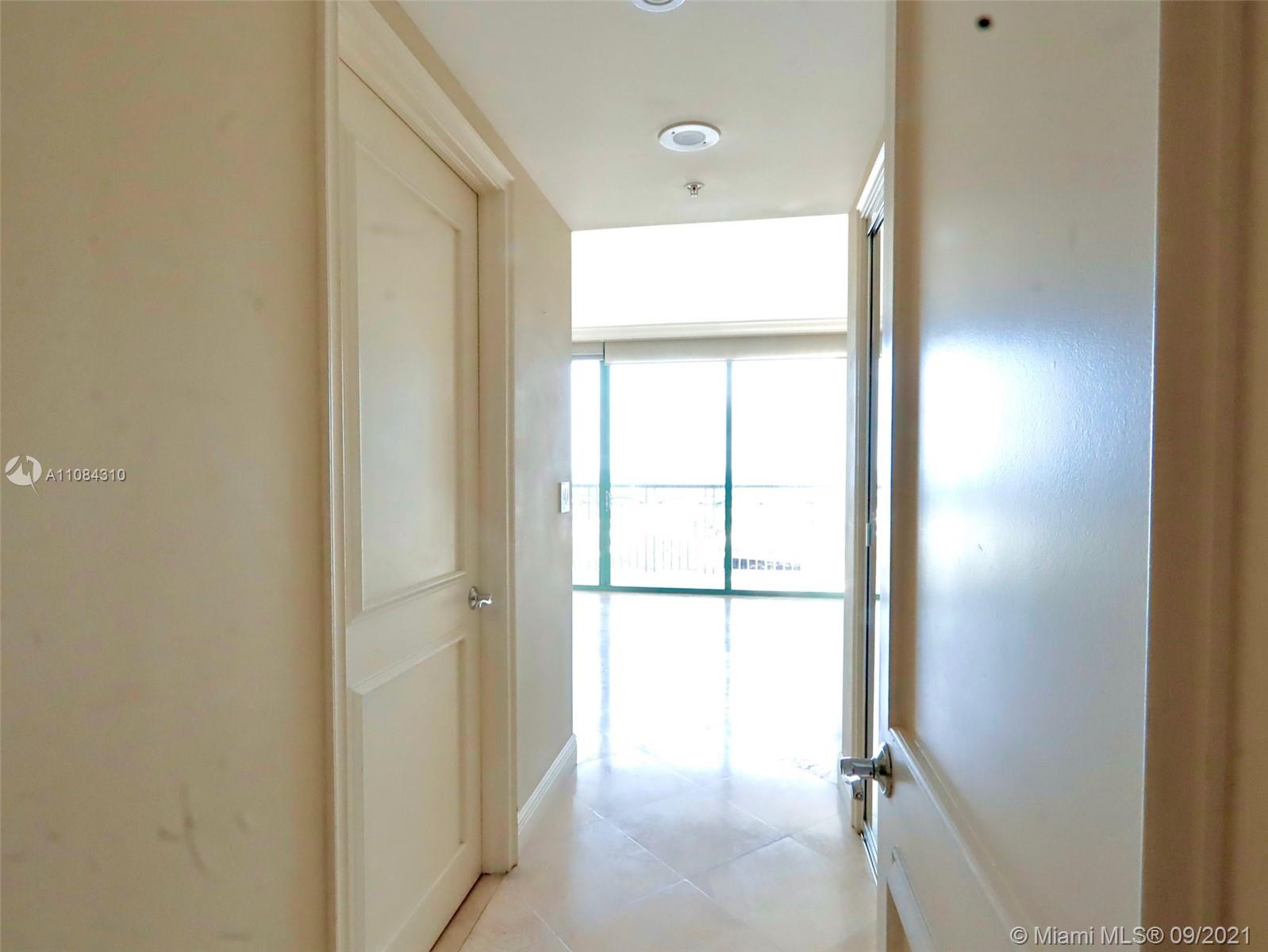 The Grove Coconut Grove, FL 33133 - Photo 31 of 31 a bathroom with a glass shower door