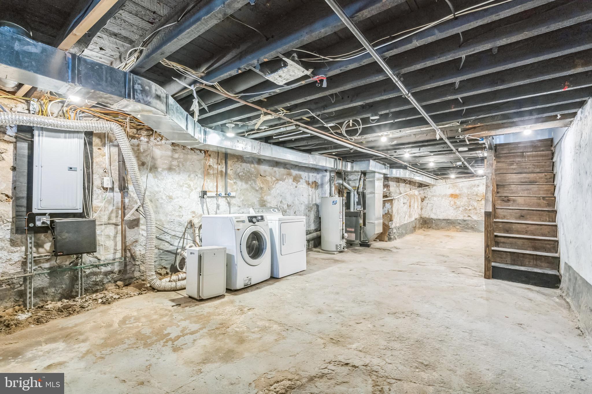 1816 Reed Street Philadelphia, PA 19146 - Photo 27 of 30 a view of a garage room with washing machine