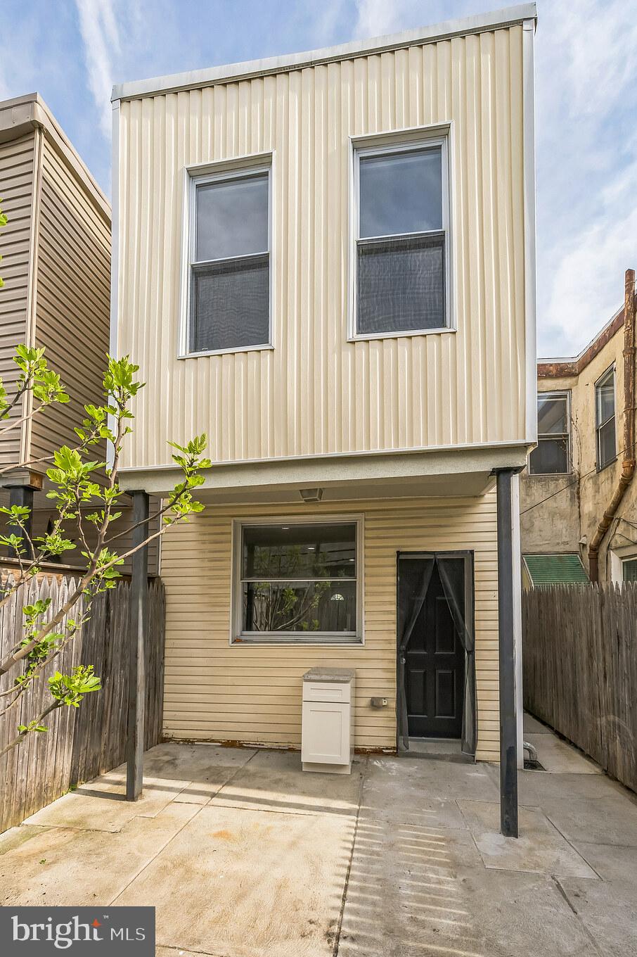 1816 Reed Street Philadelphia, PA 19146 - Photo 29 of 30 a front view of a house with a garage