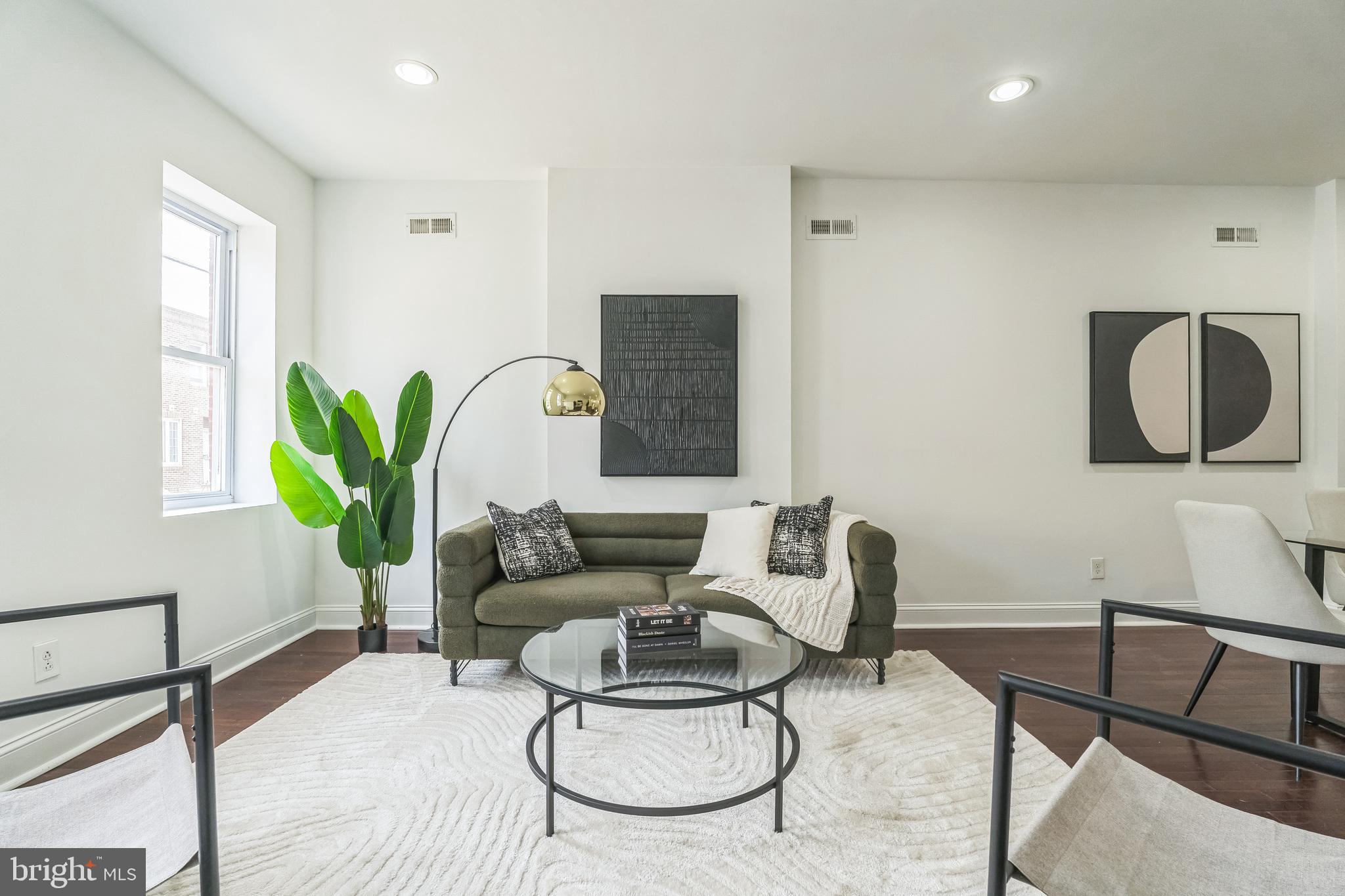 1816 Reed Street Philadelphia, PA 19146 - Photo 6 of 30 a living room with furniture