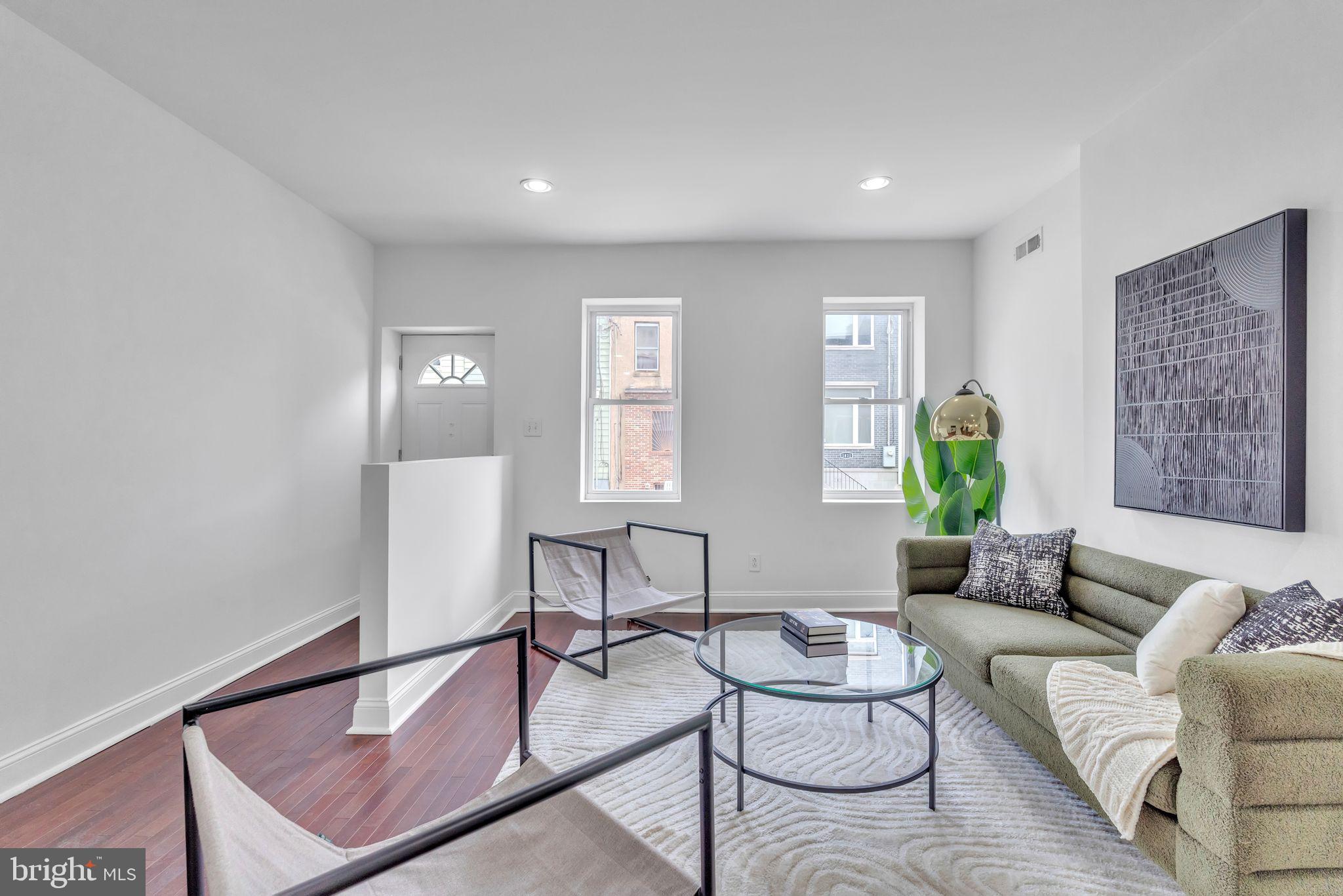 1816 Reed Street Philadelphia, PA 19146 - Photo 8 of 30 a living room with furniture and wooden floor